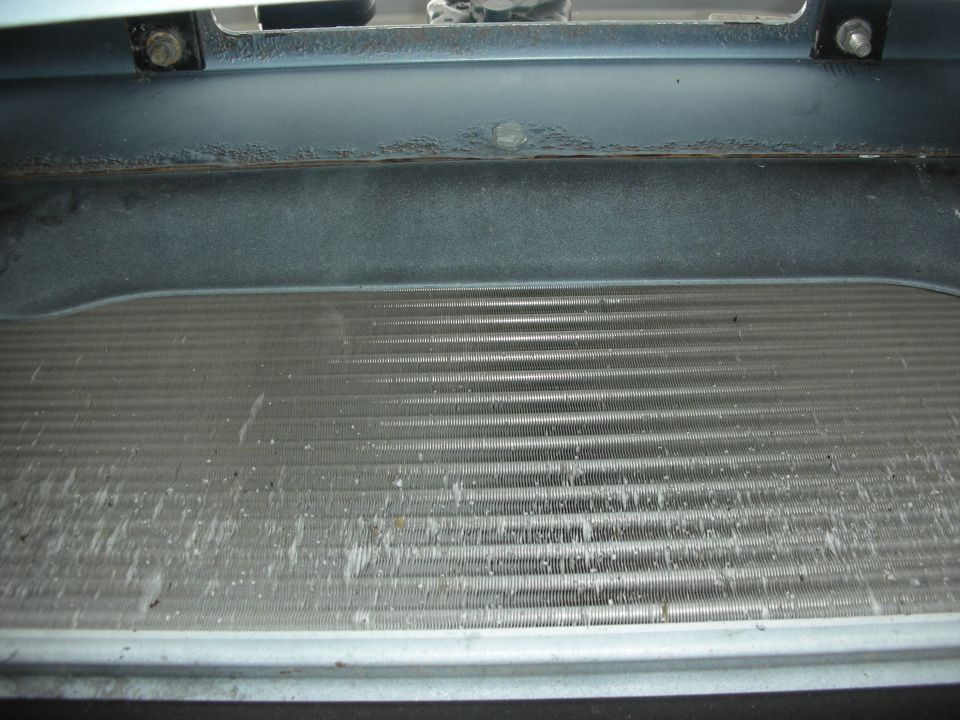 Radiator grille with debris