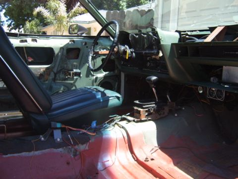 1973 Ford Ranchero - Interior view of a 1973 Ford Ranchero undergoing restoration, with most of the trim removed.