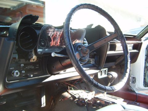 1973 Ford Ranchero - Interior view of a 1973 Ford Ranchero, showing the dashboard, steering wheel, and center console.