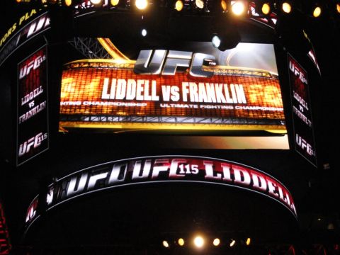 1996 Ford Bronco - The screens display information for the Ultimate Fighting Championship event, UFC 115.