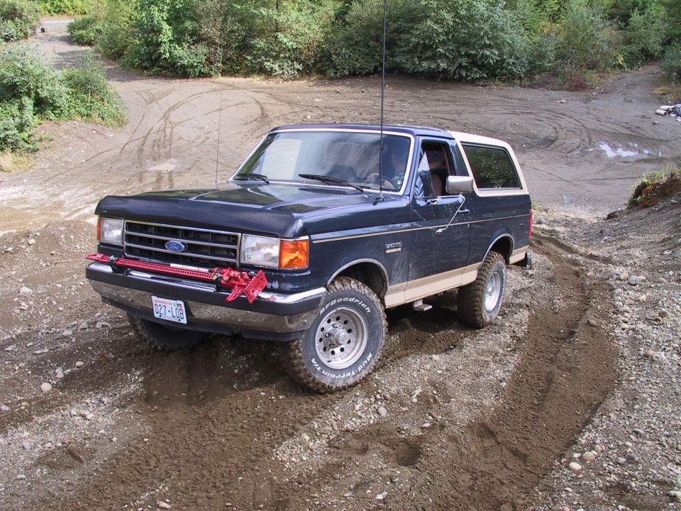 1991 Ford Bronco 3/4 front view in a gravel pit