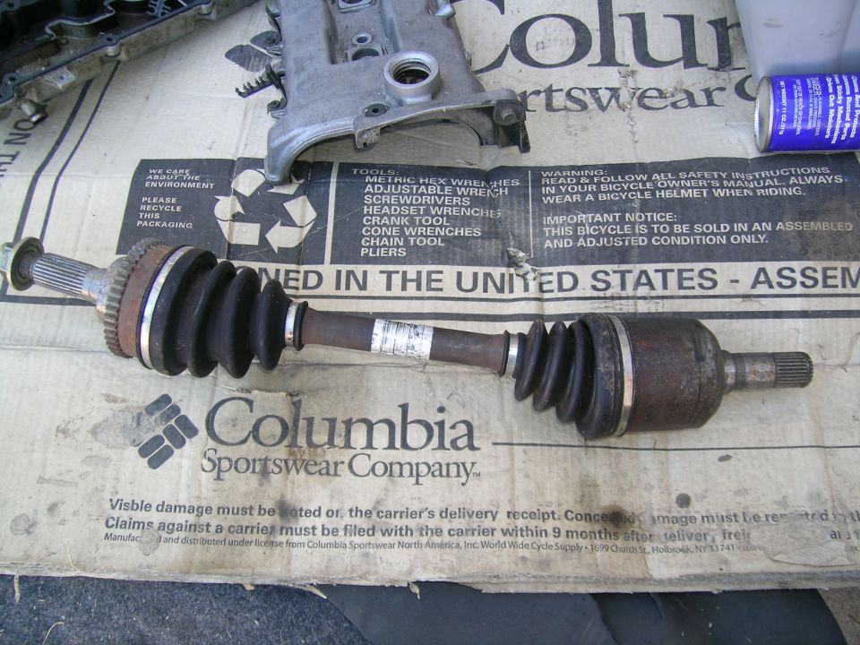 CV axle part with rubber boots and metal components