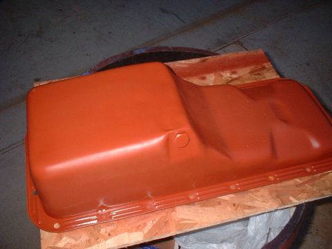 1968 Ford Mustang - An orange oil pan sits on wooden planks, with a SuperMotors.net watermark in the corner.