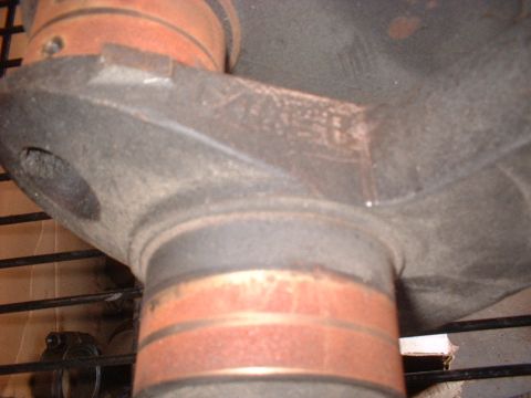 1964 Ford Galaxie - A close-up view of a mechanical component distinct orange banding.