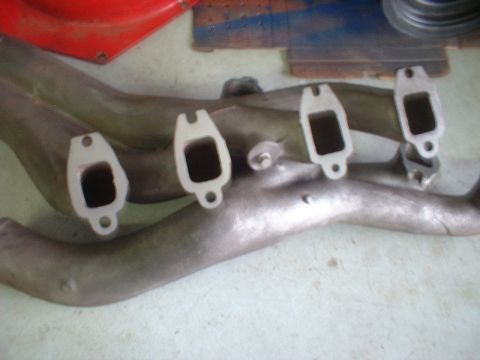 1964 Ford Galaxie - Exhaust manifold with four ports visible.