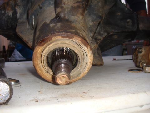 1992 Ford Bronco - This image shows a close-up view of a vehicle's front axle hub and spline shaft, likely during a repair or build process.