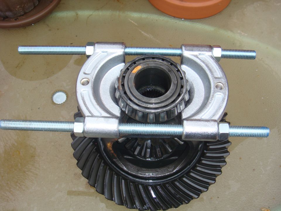 Differential gear with bearing puller tool attached