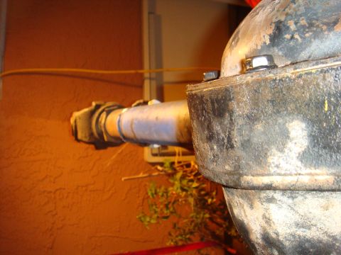 1992 Ford Bronco - This image shows a close-up of an axle housing and pipe, not a 1992 Ford Bronco.