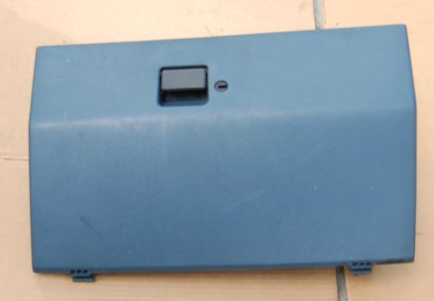 1988 Ford Bronco - A blue glove box door with a black latch is shown, likely a replacement part.
