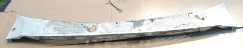 1988 Ford Bronco - This is a windshield cowl panel, likely from an older vehicle, showing signs of wear and tear.
