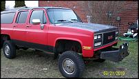 1991 GMC Suburban - This 1991 GMC Suburban is shown with a custom front bumper and lifted suspension.