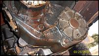 1991 GMC Suburban - Close-up of the vehicle's transmission assembly, showing mechanical parts.