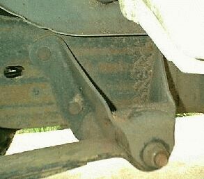 1990 Ford Bronco - This picture shows the stock front hanger *for the rear springs* on my '90 Bronco. NOTE this is the hanger just behind the doors and is the…