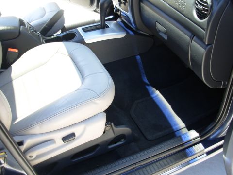 2002 Jeep Liberty - Interior view of a Jeep, highlighting the passenger seat and dashboard area.