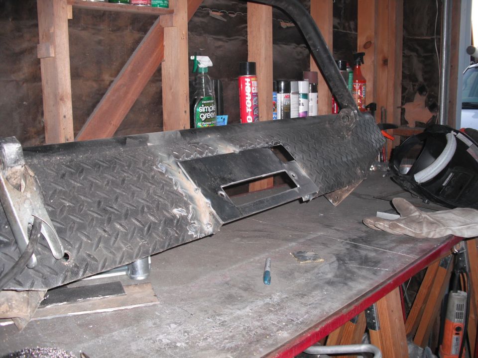 Custom diamond plate bumper part on workbench