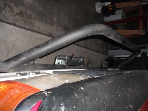 1991 Ford Bronco - Close-up view of a vehicle's roll bar and taillight assembly.