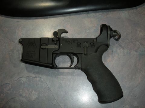 1996 Ford Bronco - This is a Spike's Tactical AR-15 lower receiver, a firearm component, not a vehicle.