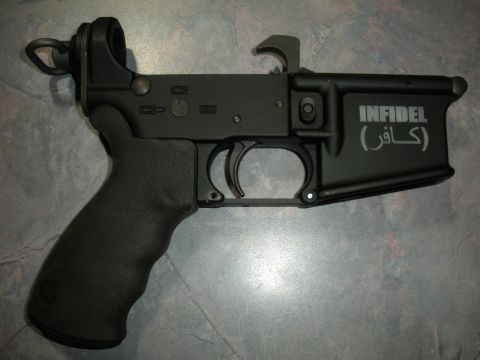 1996 Ford Bronco - AR-15 lower receiver engraved with 'INFIDEL' and Arabic text.