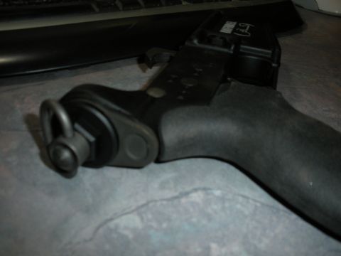 1996 Ford Bronco - A close-up shows a tool part with a ring and bolt mechanism.