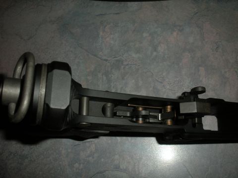 1996 Ford Bronco - Internal components of a firearm lower receiver are visible in this close-up view.