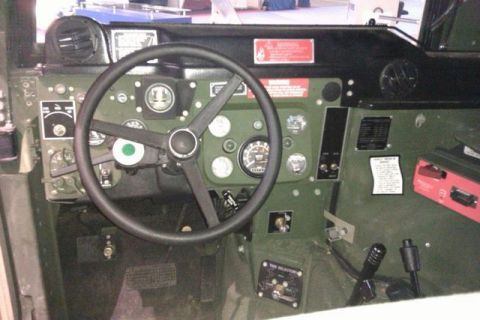 1991 Ford Crown Victoria - Interior view of a Humvee dashboard, showing various gauges and controls.