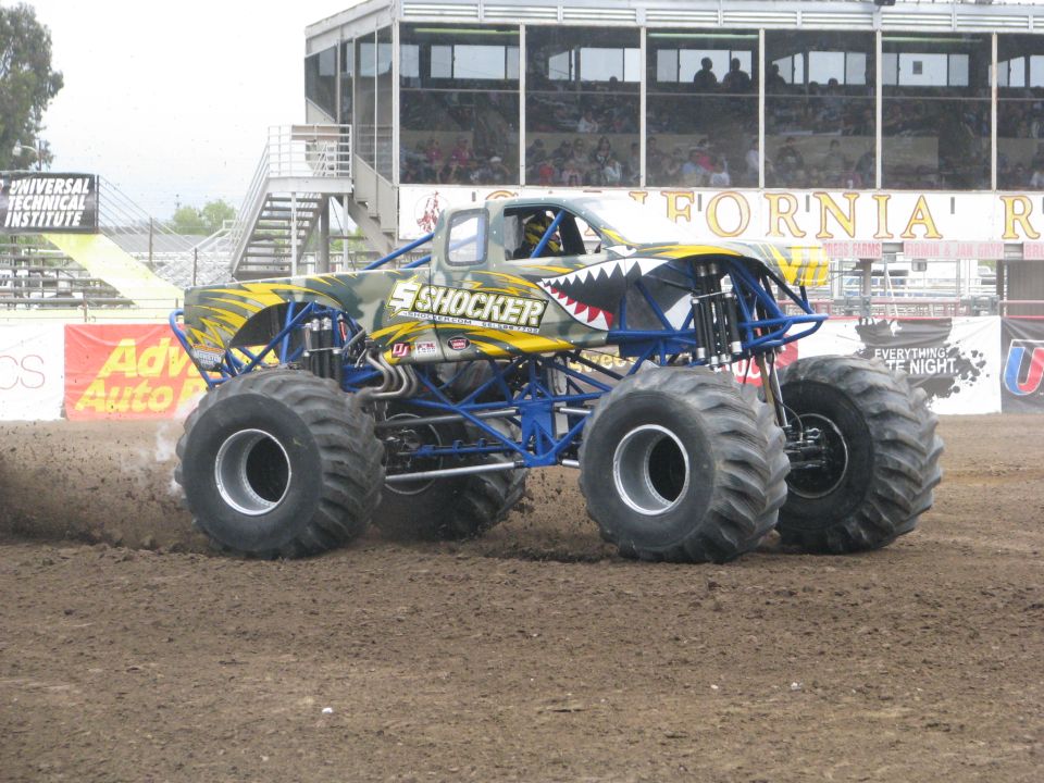 Monster truck with shark teeth paint and 'SHOCKER' text