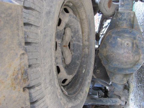 2005 Dodge 3500 - Rear axle and wheel detail of a heavy-duty truck, showing the differential and suspension components.