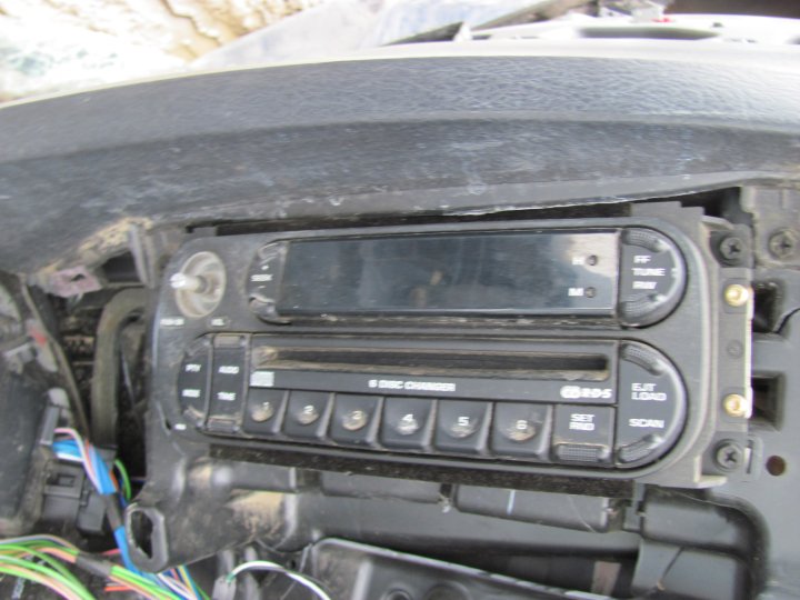 Car stereo with CD changer and radio controls