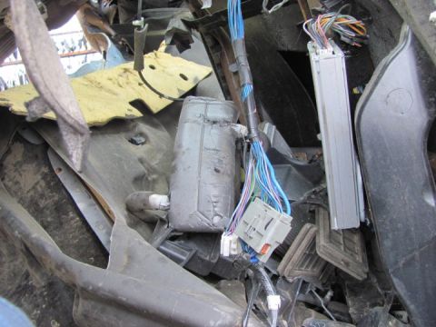 2005 Dodge 3500 - Close-up view of a vehicle's interior wiring harness and electrical components.
