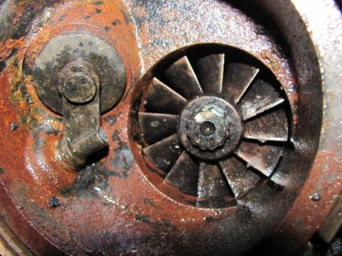 2005 Dodge 3500 - Rusty turbocharger component, likely from an older diesel engine.