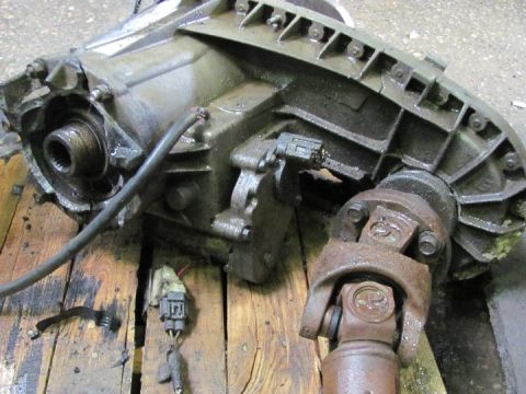 2005 Dodge 3500 - Transmission assembly with driveshaft components, likely from a truck.