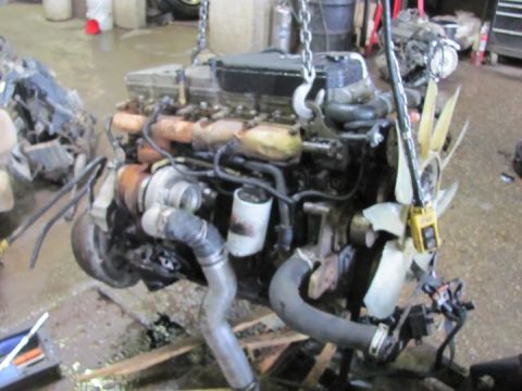 2005 Dodge 3500 - This is a close-up view of an engine assembly, likely removed from a vehicle for repair or replacement.