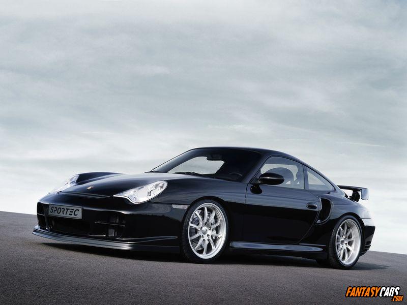 Black Porsche 911 Sportec with a rear spoiler and silver wheels
