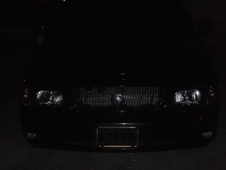 2003 Mercury Marauder front grille and headlights, license plate AZFD 635