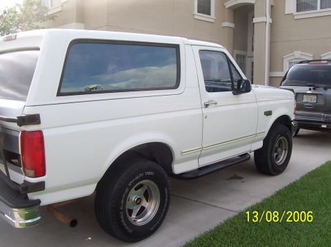 1994 Ford Bronco - This 1994 Ford Bronco is seen in a 3/4 front view, its distinctive removable hardtop and aftermarket wheels.