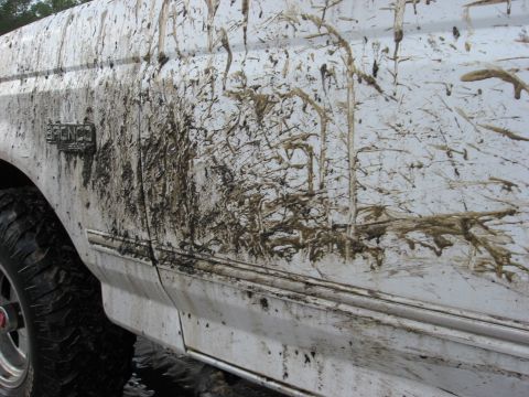 1994 Ford Bronco - This Bronco has seen some off-road action, judging by the extensive mud coverage on its side.