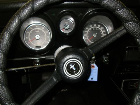 1971 Ford Mustang - Dashboard view of a 1971 Ford Mustang interior, gauges and the steering wheel.