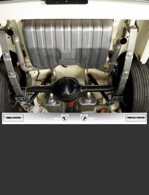 1968 Mercury Cougar - Undercarriage view of a 1968 Mercury Cougar showing the rear axle and exhaust.
