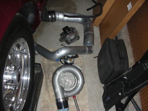 1992 Ford Crown Victoria - Turbocharger and intake plumbing components are shown, possibly for a performance engine build.