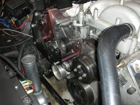 1992 Ford Crown Victoria - Close-up of engine components including intake, pulleys, and custom mounting hardware.