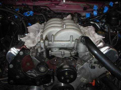 1992 Ford Crown Victoria - Close-up view of an engine bay, focusing on the intake manifold and associated components.