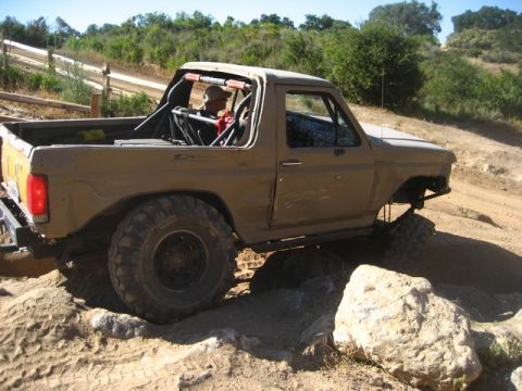 1989 Ford Bronco - A modified Ford Bronco tackles a challenging off-road course.