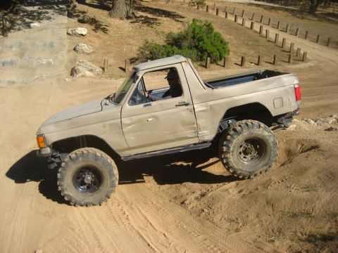 1989 Ford Bronco - This 1989 Ford Bronco is navigating a challenging off-road course.