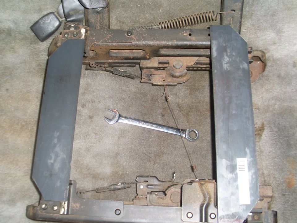 Seat frame mechanism with wrench on carpet
