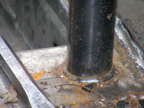 1989 Ford Escort - Detail of a metal frame showing rust and welding work.