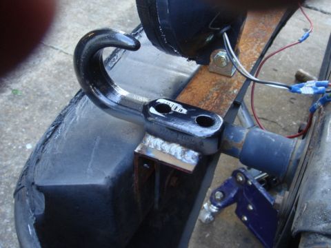 1989 Ford Escort - Welded tow hook assembly with visible electrical connections and wiring.
