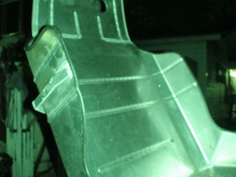1989 Ford Escort - Close-up view of a metal seat base, likely from a custom or racing application.
