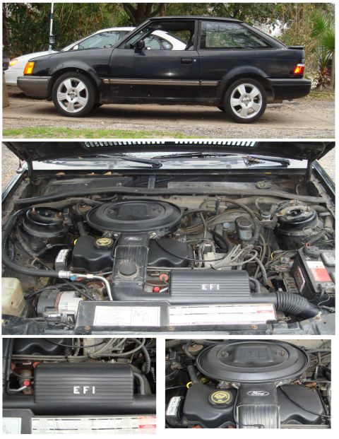 1989 Ford Escort - This 1989 Ford Escort coupe is shown from the side and with its hood open, revealing the engine bay with an EFI label.