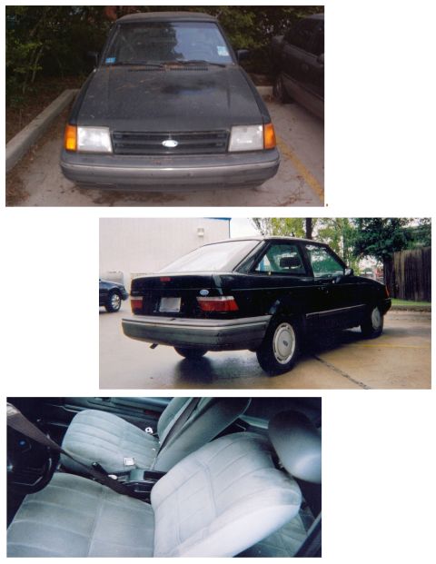 1989 Ford Escort - Front view of a 1989 Ford Escort, showing its grille and headlights.
