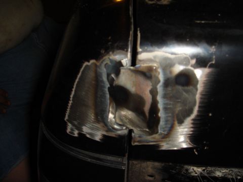 1989 Ford Escort - Close-up of a freshly welded body panel, showing the metalwork and repair process.